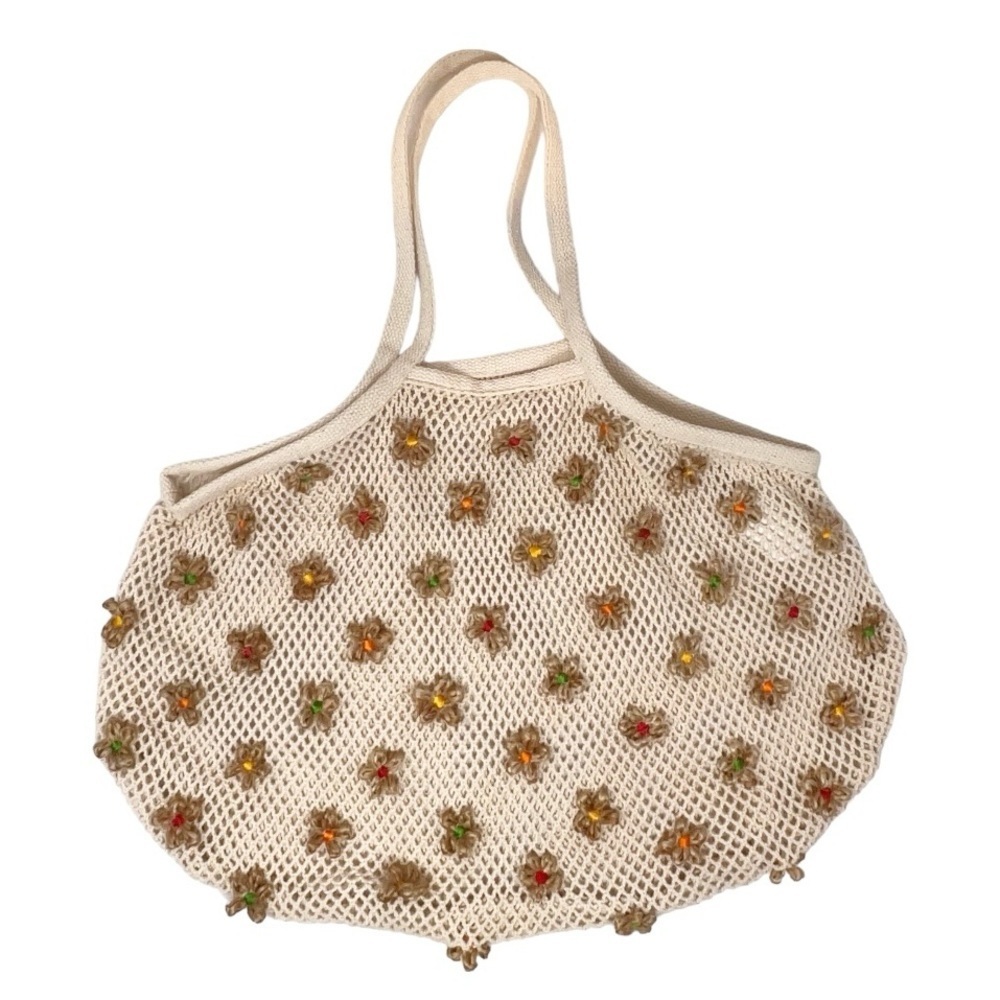 Urban outfitters- Knit bag with flowers never used